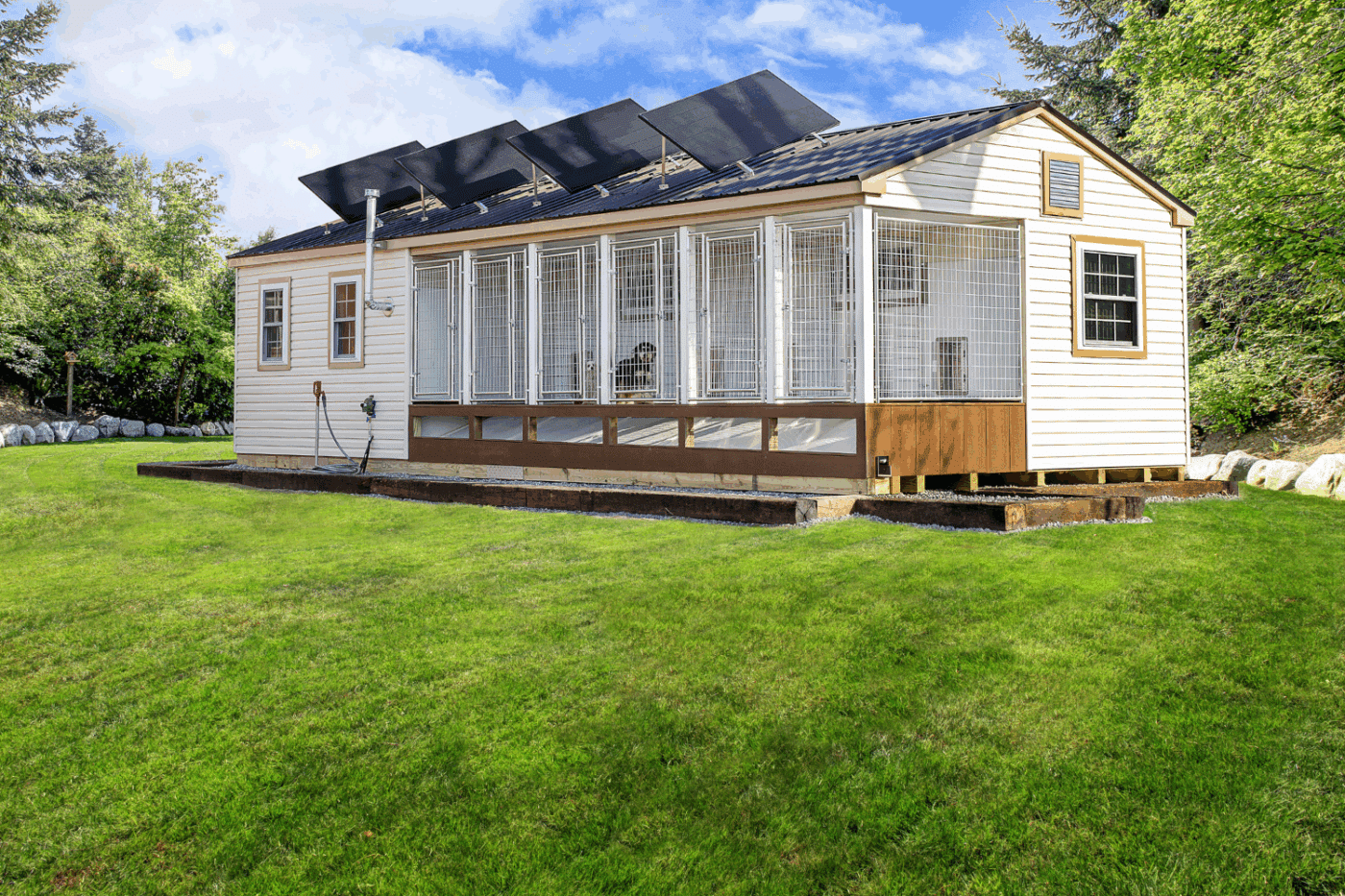 14x34 white kennel with 6 runs and solar panels for kennel business in rhode island