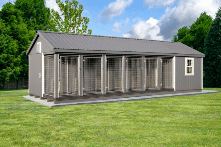 gray commercial dog kennel with metal roofing and white trim