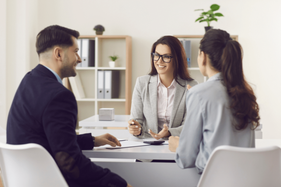man and woman setting up legal and financial aspects of their dog kennel business