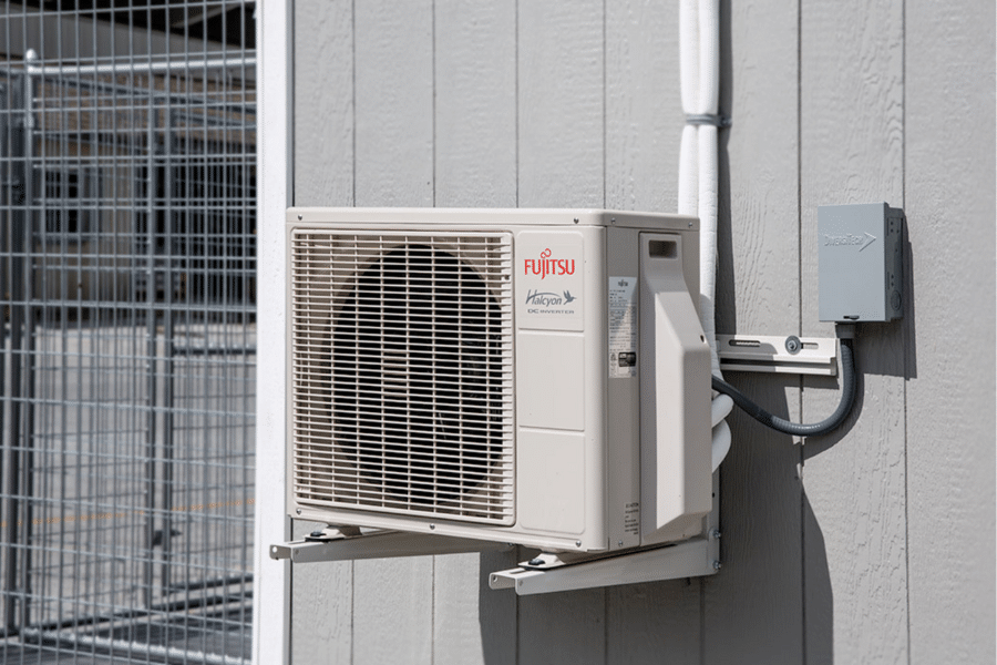 split unit heater_AC attached to outside of dog kennel